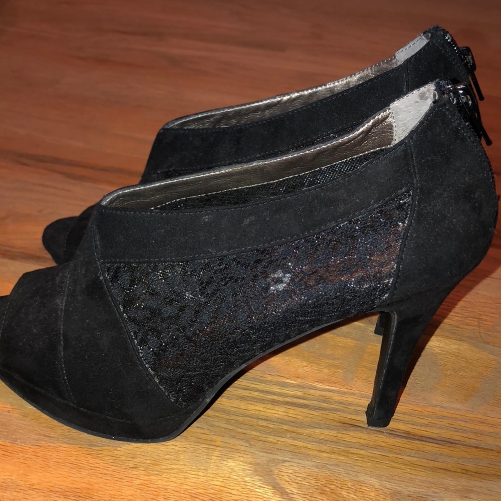 Black heels with lace sides worn once